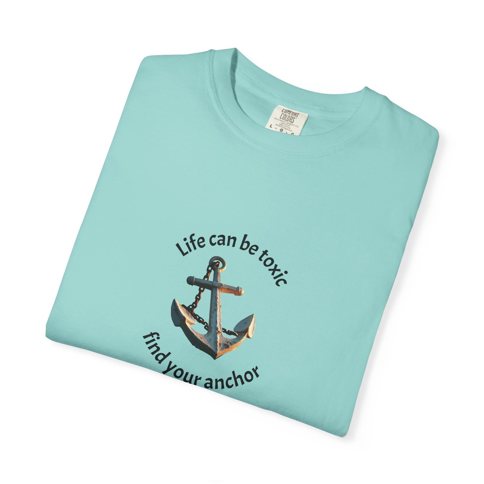 T-shirt with the phrase "Life can be toxic, find your anchor." This t-shirt is sure to keep you grounded. Makes a great gift.