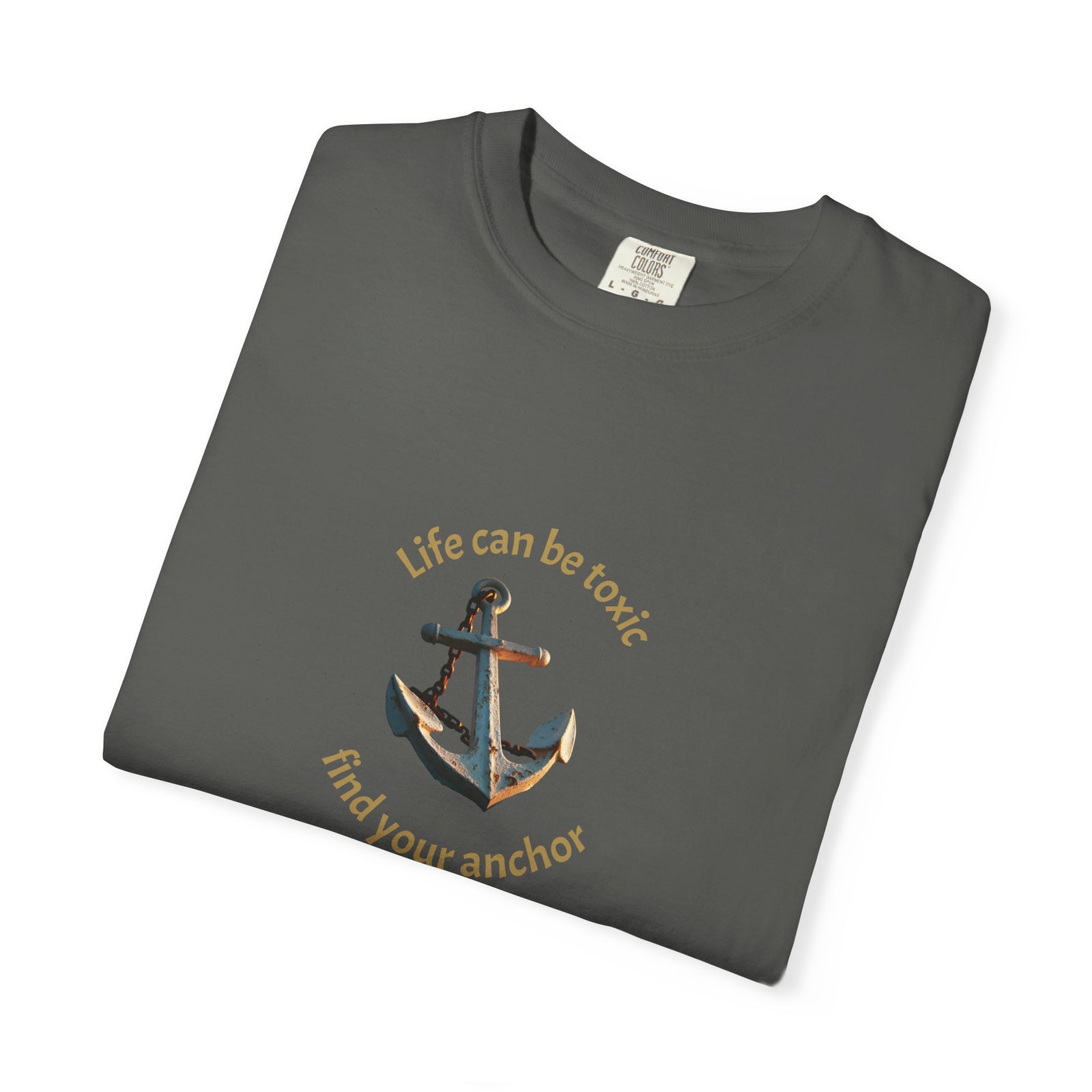 T-shirt with the phrase "Life can be toxic, find your anchor." This t-shirt is sure to keep you grounded. Makes a great gift.