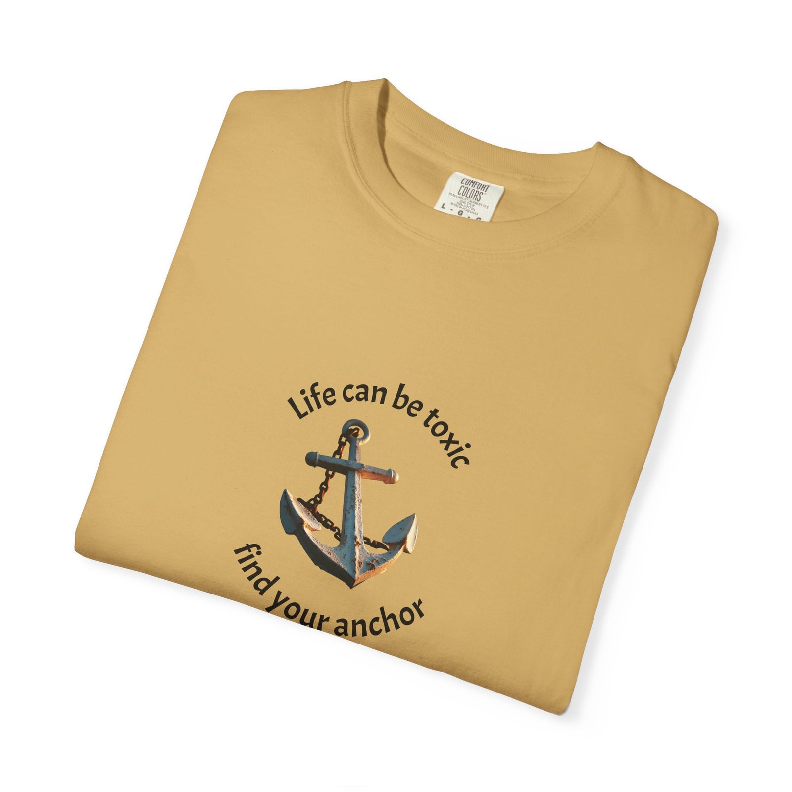T-shirt with the phrase "Life can be toxic, find your anchor." This t-shirt is sure to keep you grounded. Makes a great gift.