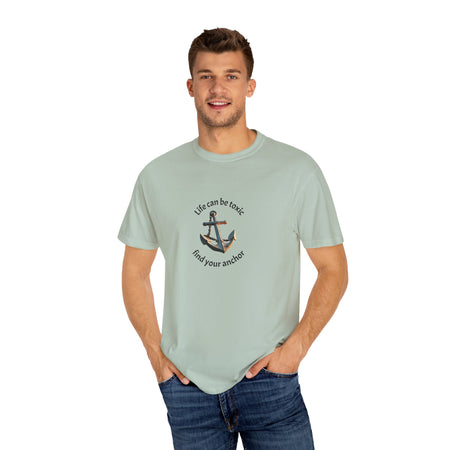 T-shirt with the phrase "Life can be toxic, find your anchor." This t-shirt is sure to keep you grounded. Makes a great gift.